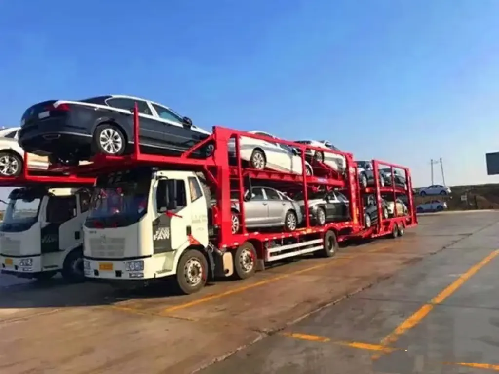 Car-carrier trucks lined up at the port