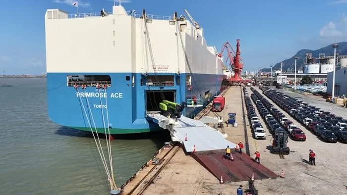 Ro-Ro vessel loading vehicles at port